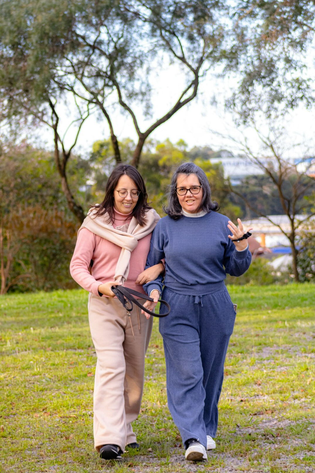 senior couple walking in park