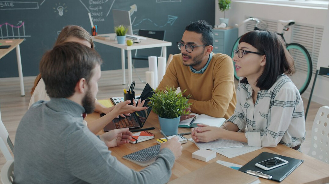 group discussing news